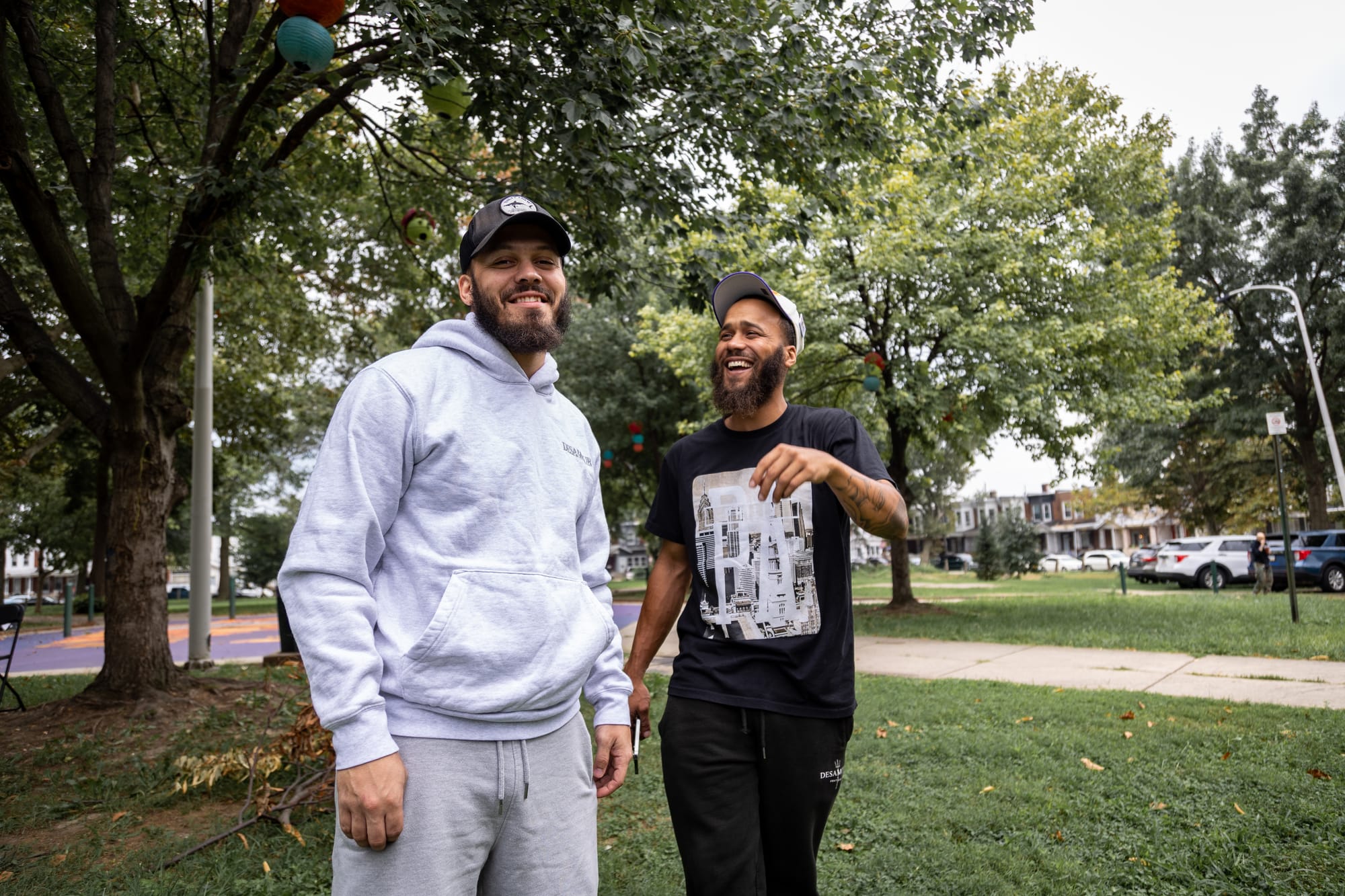 Photos of Kensington: Community members participate in the second annual "Community Water Gun Fight" in Harrowgate Park.