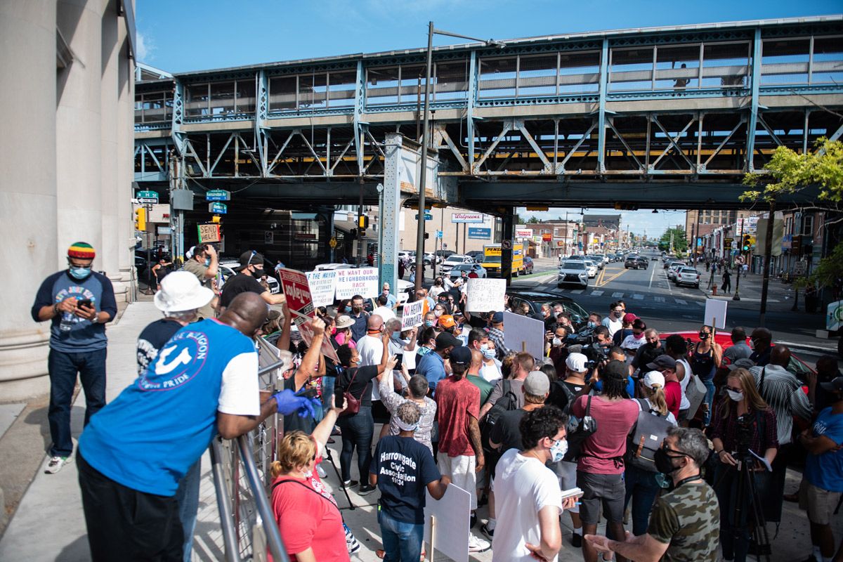 Protesters gather at Kensington's main intersection to send a